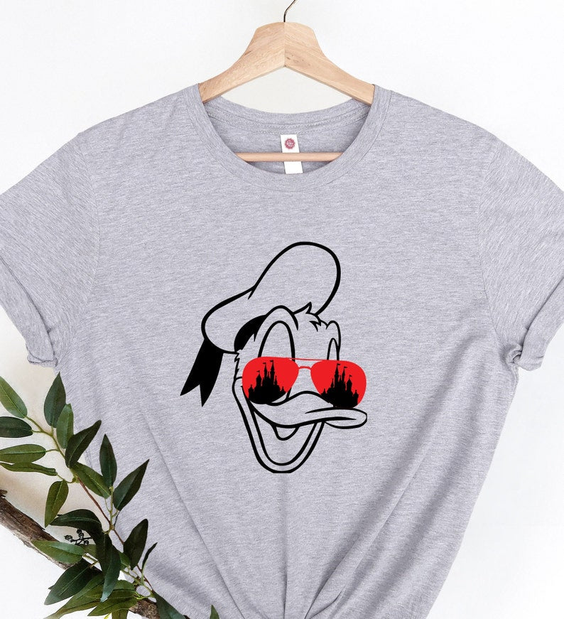 Donald Duck with Disney Castle in Eyes T-Shirt, Magical Disney Design,Perfect for Disney Fans,Unique Donald Shirt with Iconic Castle Artwork