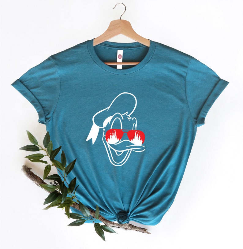 Donald Duck with Disney Castle in Eyes T-Shirt, Magical Disney Design,Perfect for Disney Fans,Unique Donald Shirt with Iconic Castle Artwork