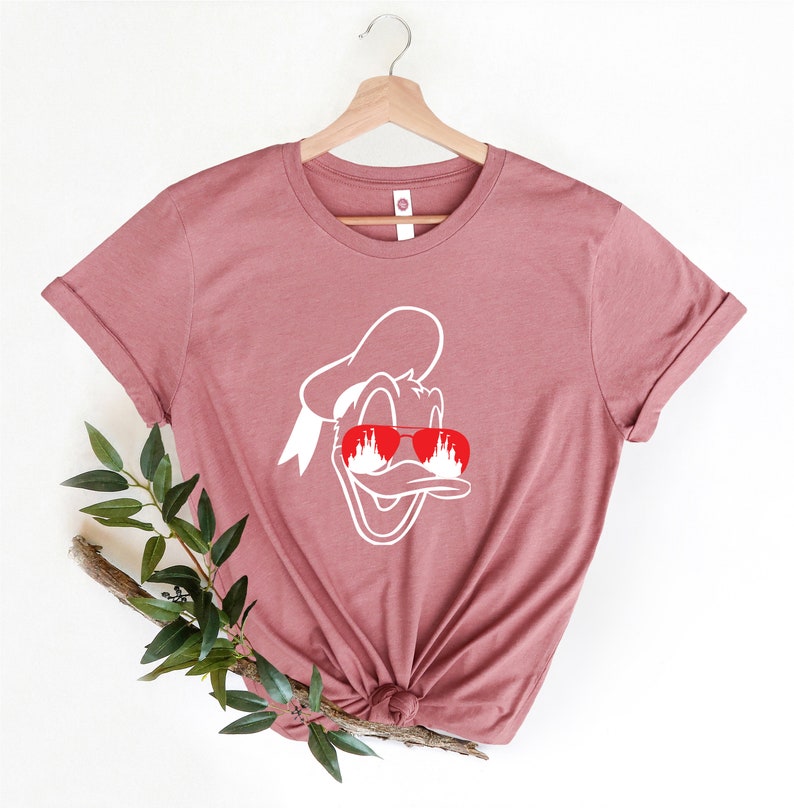 Donald Duck with Disney Castle in Eyes T-Shirt, Magical Disney Design,Perfect for Disney Fans,Unique Donald Shirt with Iconic Castle Artwork