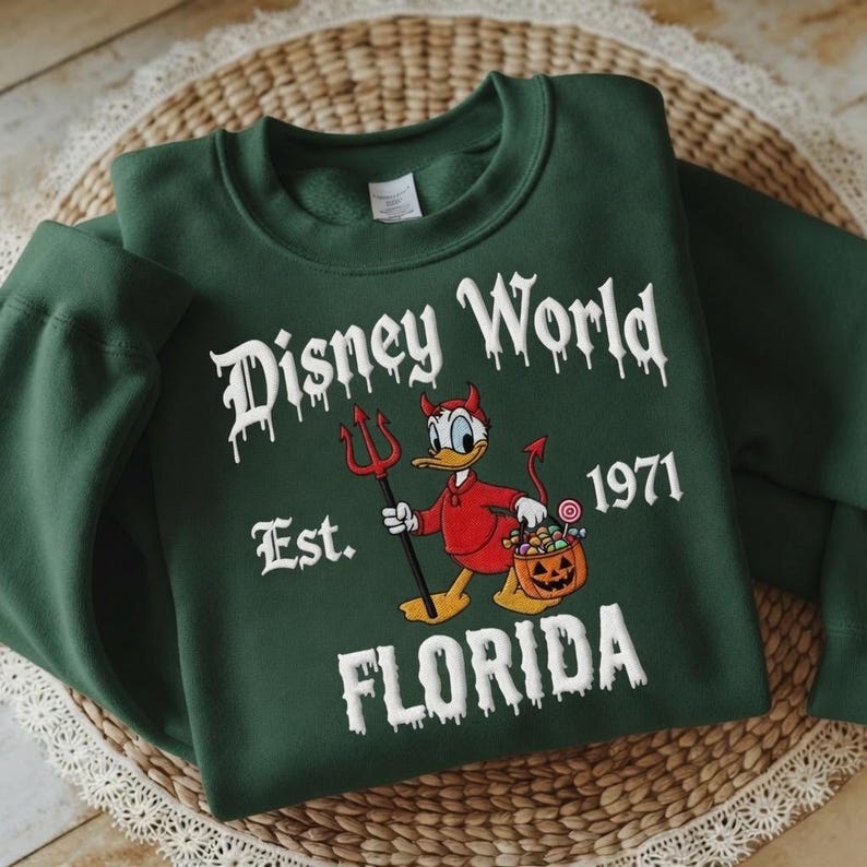 Embroidered Donald Duck Devil Halloween Sweatshirt, Disney WorldHalloween Crewneck, Donald Halloween Sweater, Spooky Disney Trip Shirt