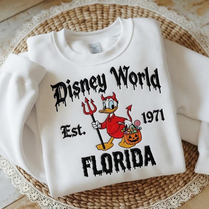 Embroidered Donald Duck Devil Halloween Sweatshirt, Disney WorldHalloween Crewneck, Donald Halloween Sweater, Spooky Disney Trip Shirt