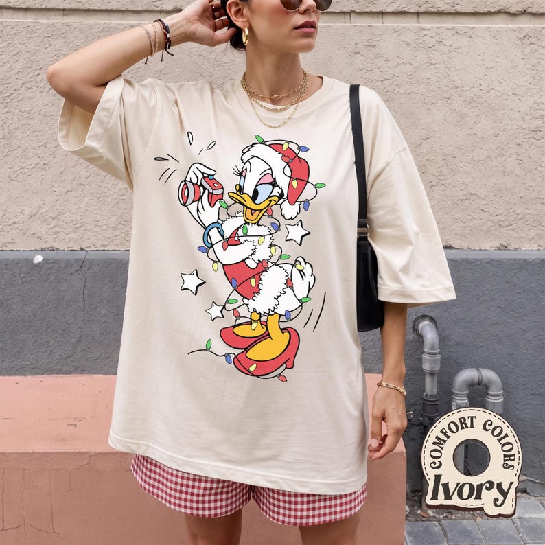Disney Santa Donald and Daisy Christmas Lights T-shirt, Donald and Daisy Christmas Couple Shirt, Disneyland Christmas Trip Matching Shirt