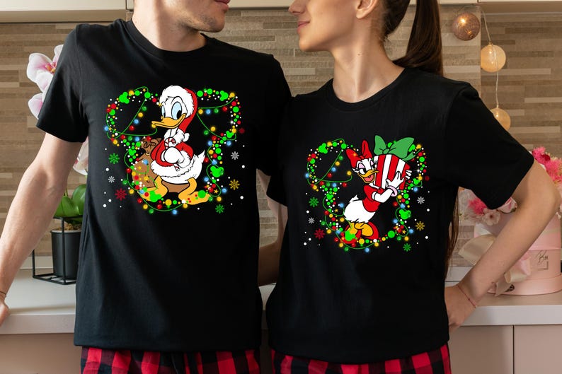 Disney Santa Donald and Daisy Christmas Lights T-Shirt, Donald And Daisy Christmas Couple Shirt, Disneyland Christmas Trip Matching Outfit