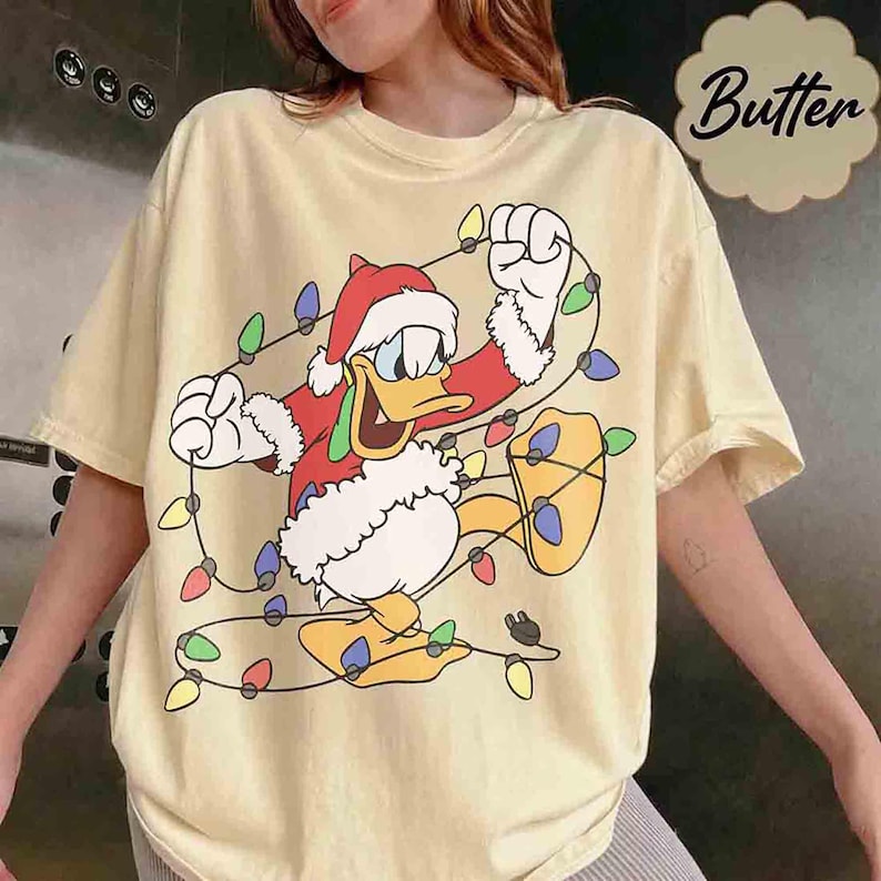 Disney Santa Donald And Daisy Christmas Lights Shirt, Donald Daisy Christmas Couple Tee, WDW Disneyland Christmas Family Trip Matching Shirt