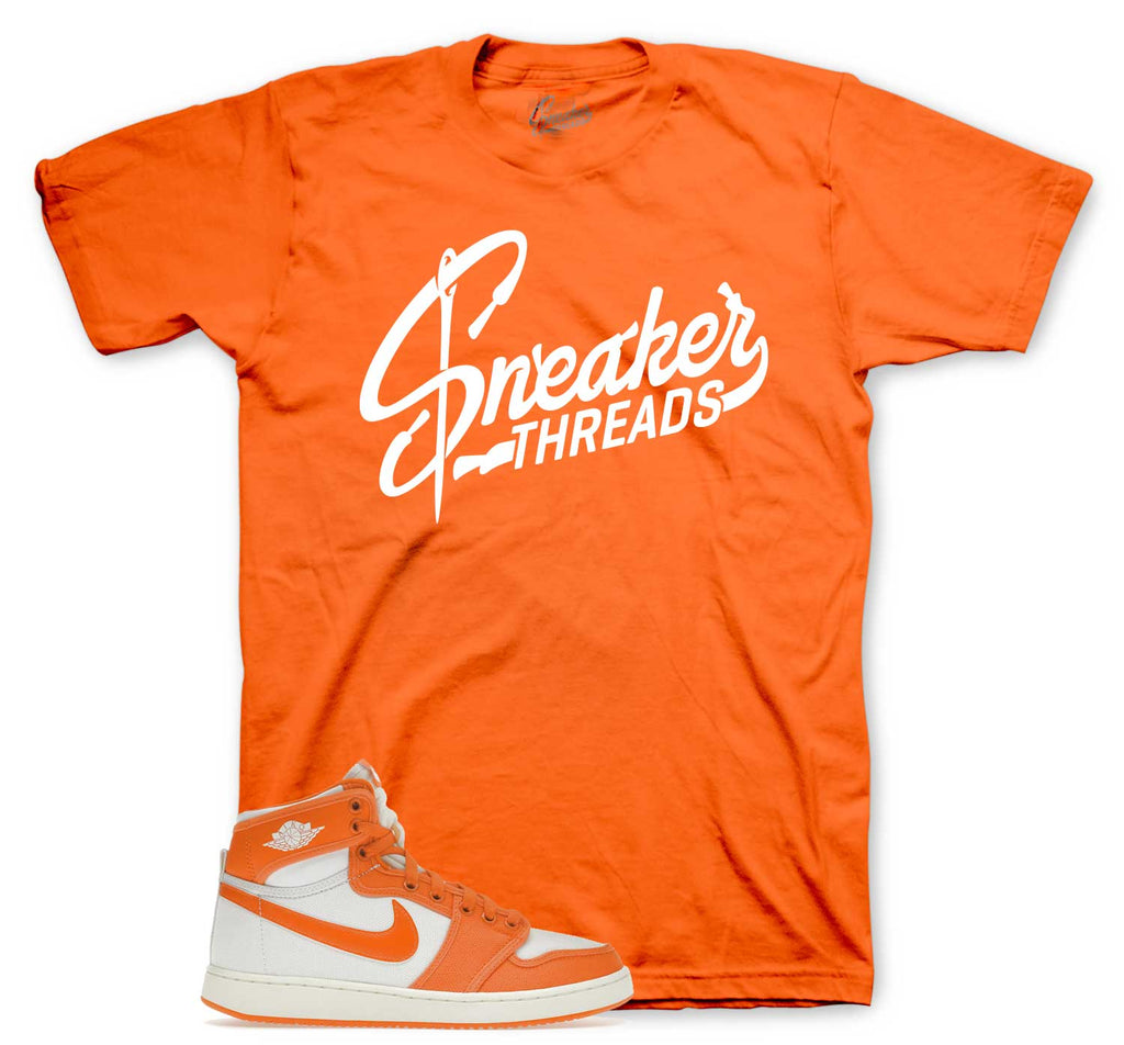 Retro 1 AJKO Rush Orange ST Logo Shirt
